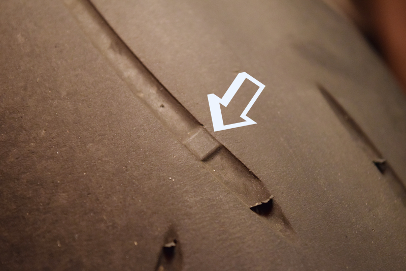 Keep an eye on your tread wear as well, always making sure it has not yet worn down to the level of the wear bar (arrow). If the wear bar is level with the tire’s surface, it is time to replace it.