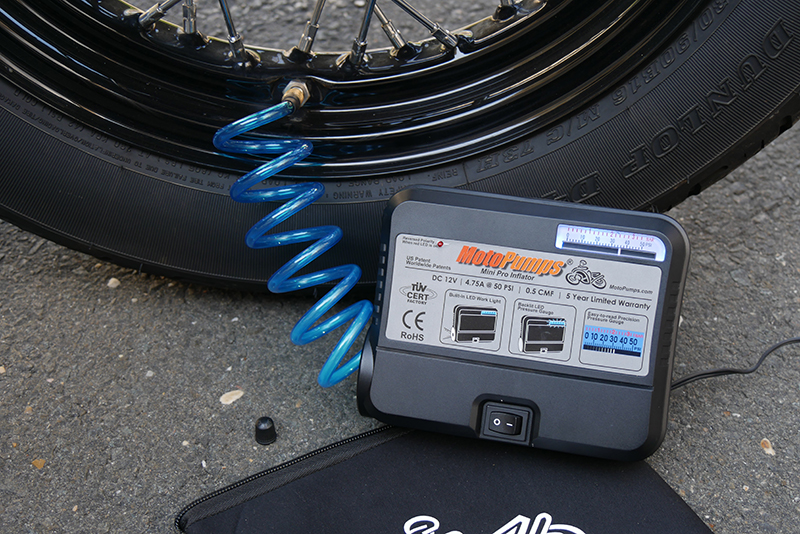 This portable MotoPump Mini Pro inflator gets power right from your motorcycle’s battery, and has a built-in LED light and backlit air pressure gauge which makes it easy to inflate tires on the go.