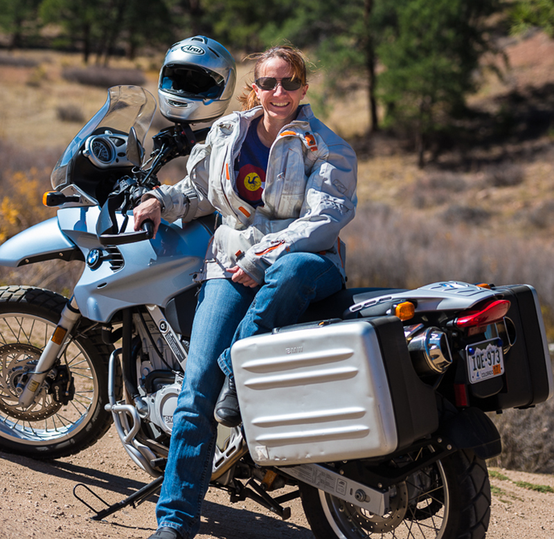 Overcoming Fear Riding BMW Motorcycle Steep Dirt Road Rider Pose