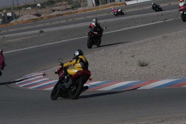 Girls in leather on fast motorcycles starting line