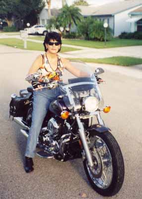 Gina accessorized her V Star with a windshield, saddlebags and other parts to make the bike comfortable for riding long distances.