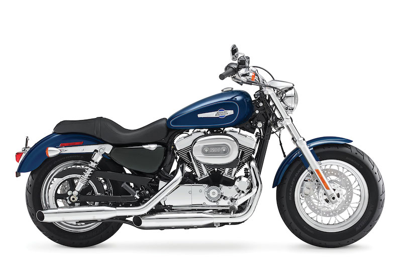The 2014 Harley-Davidson Sportster 1200 Custom has a seat height of 26.6 inches.