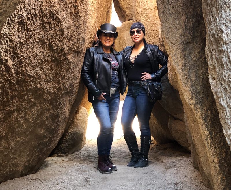 mother daughter riding motorcycles rocks