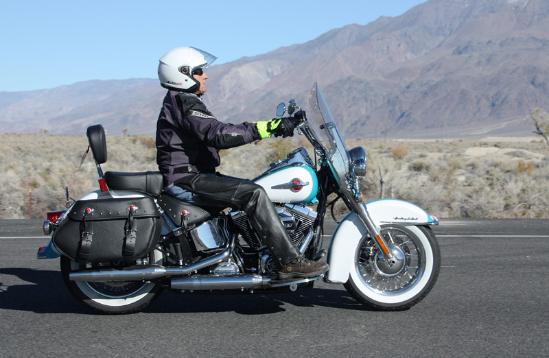 review 2016 harley davidson heritage softail classic man riding in leathers