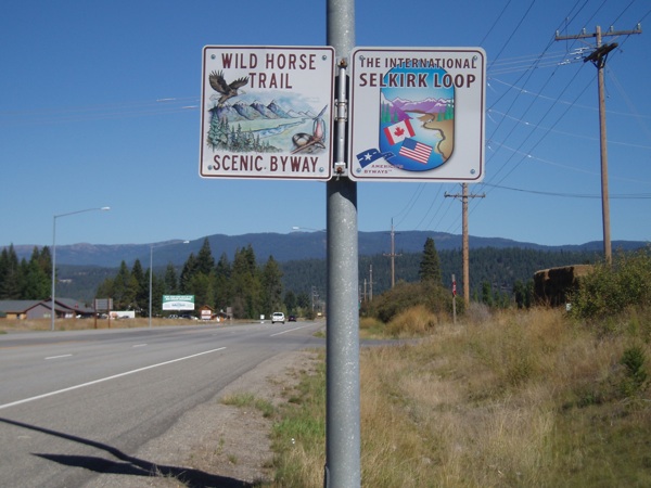 touring the selkirk loop sign