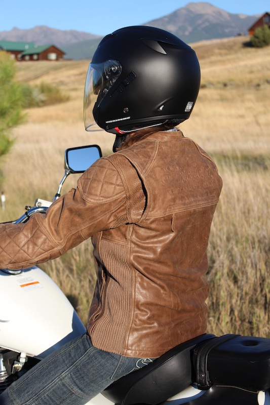 review luscious brown leather jacket from indian rear on bike