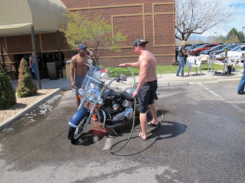 Events Steel Horse Sisterhood Summit firemen wash motorcycle
