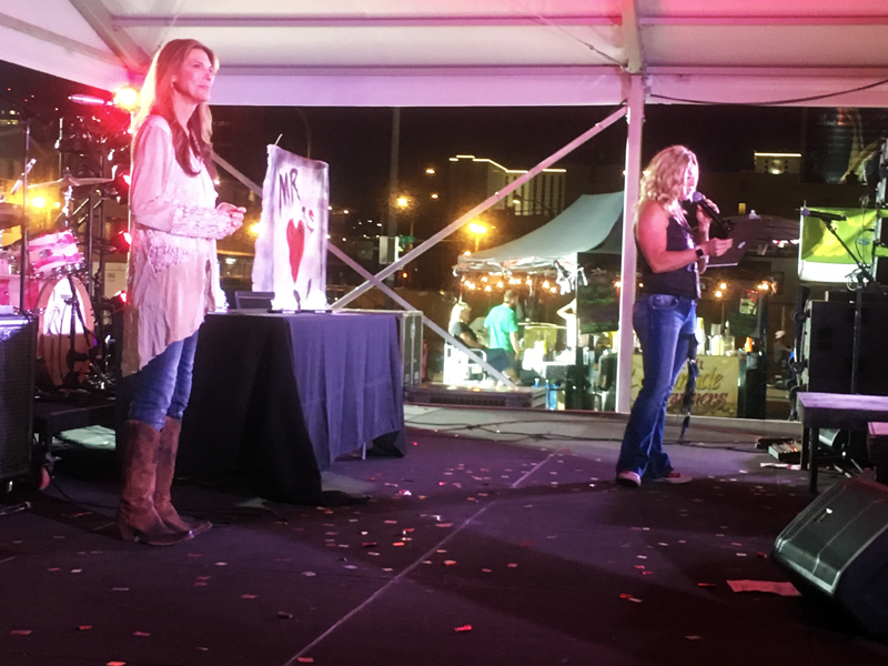 two-time motorcycle hall of famer genevieve schmitt on stage in las vegas