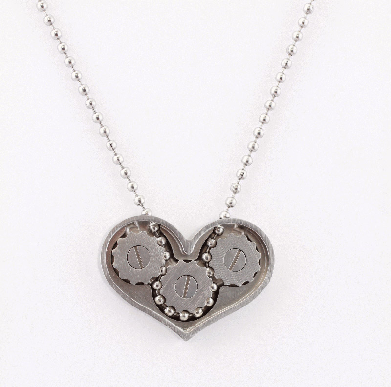 heart shaped gear necklace and ring