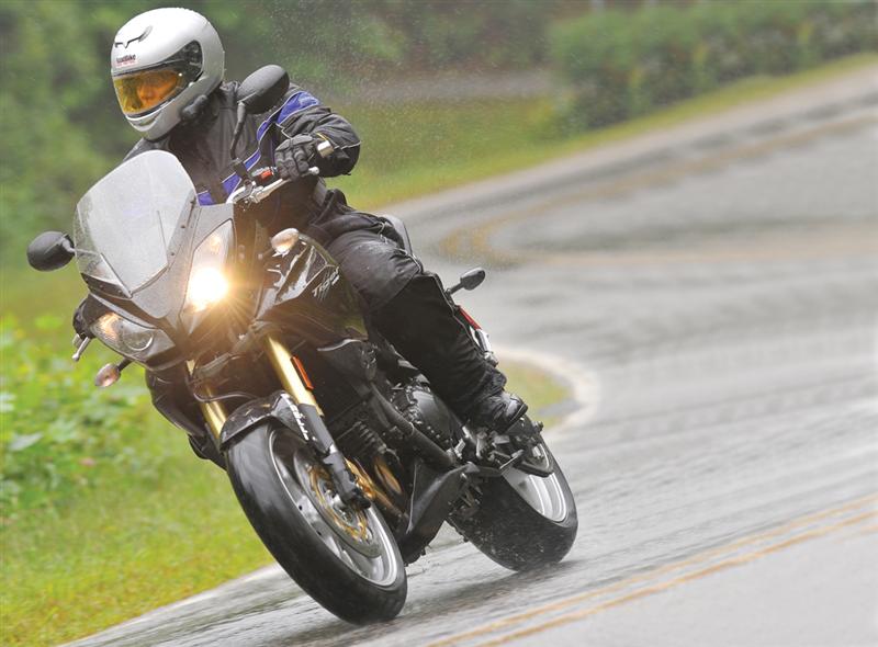 Riding a motorcycle in the rain is sometimes unavoidable. Always slow down your speed and follow the rules about limiting lean angles and using more gradual braking techniques.