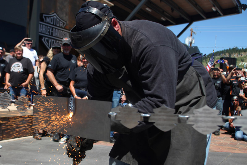 harley-davidson official motorcycle of sturgis motorcycle rally chain cutting