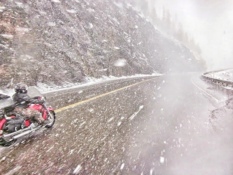 strength and fortitude of one woman motorcycle rider sash walker snow storm