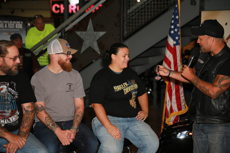 female retired air force medic receives new motorcycle as gift