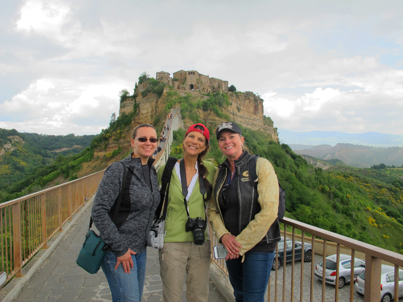 why you should ride a motorcycle in italy once in your life civita bagnaregio women 