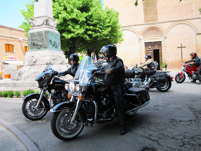 why you should ride a motorcycle in italy once in your life women on harleys