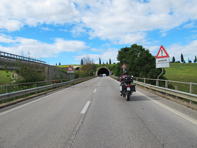 why you should ride a motorcycle in italy once in your life road sign