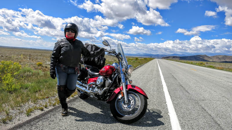 strength and fortitude of one woman motorcycle rider sash walker