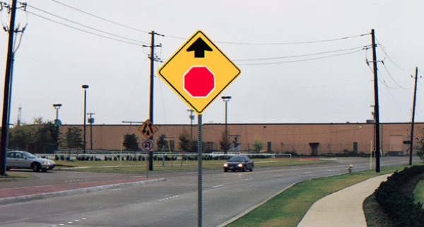 no more wide turns stop sign ahead