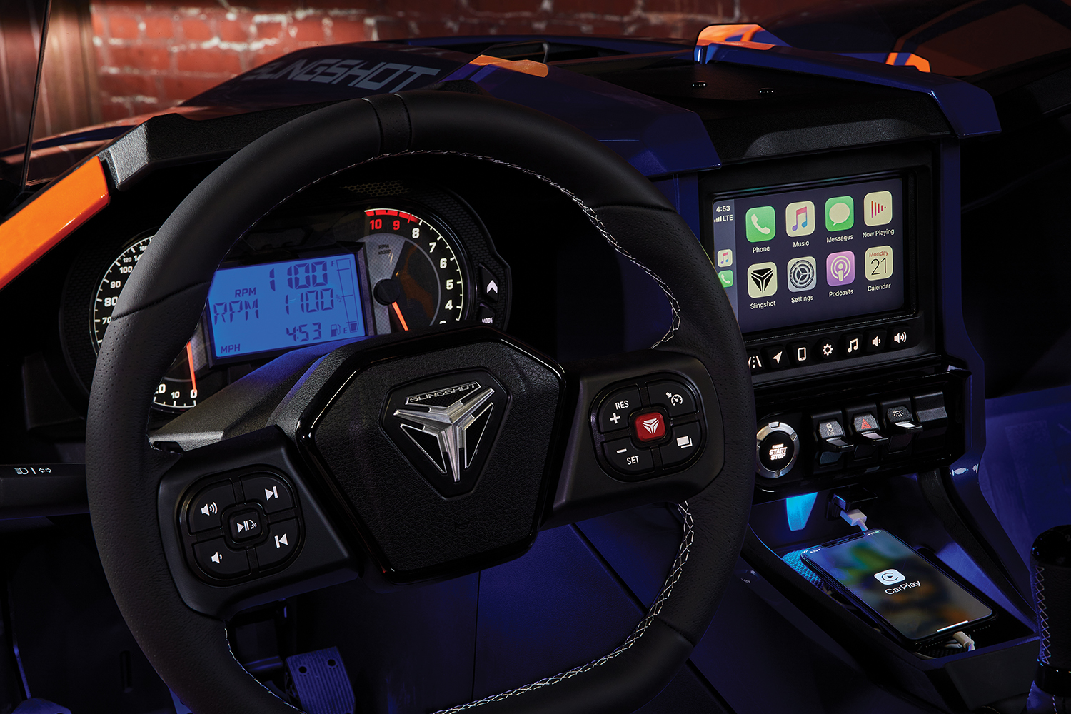 The Slingshot R models come standard with Apple CarPlay which integrates iPhone devices with the Slingshot's built-in infotainment system. As we've seen with many recent motorcycles WRN has reviewed, riders and passengers can make phone calls with a Bluetooth headset, access music, get directions, and more.