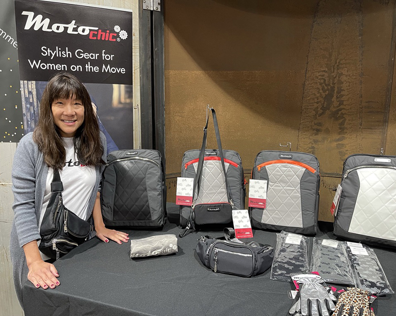 Long-time WomenRidersNow.com supporter Debra Chin brought her company’s full set of offerings to showcase at the Market. Motochic’s original <a href="https://womenridersnow.com/review-the-lauren-bag-by-motochic/" target="_blank" rel="noopener">Lauren bag WRN reviewed here </a>remains a WRN staff favorite. Current offerings also include base layer tops, socks, hats, and so many other goodies.