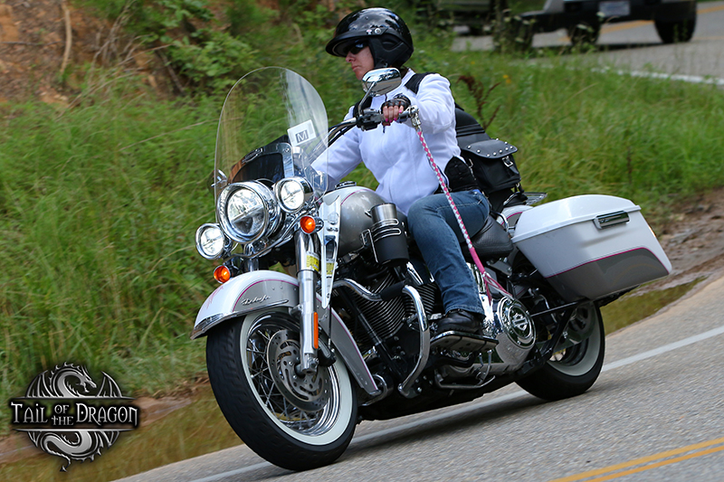 One memorable motorcycle bucket list trip is captured here with me riding my Deluxe on the <a href="https://womenridersnow.com/4-bucket-list-motorcycle-rides-in-the-east/" target="_blank" rel="noopener">Tail of the Dragon</a> in the Smoky Mountains. Photo by Killboy.