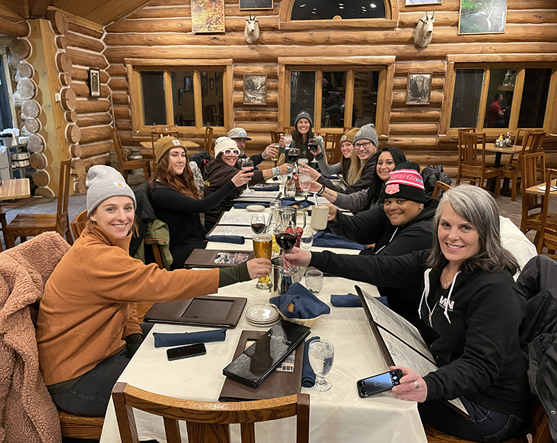 The first night’s dinner is full of smiles as the women become acquainted. Clockwise from bottom left: Polaris’ Mallory Apperson, Meghan Burns, Antonia Armenta and Brian Miller, Chef & Owners of Bonafide foods/hospitality and event services for Ride Wild, Ride Wild founder Kelly Yazdi, Build Train Race participant Michaela Trumbull, Emily Stewart, Ashley Fickbohm, Black Girls Ride founder Porsche Taylor, and WRN’s Sarah Schilke. Photo credit: Erin Sills