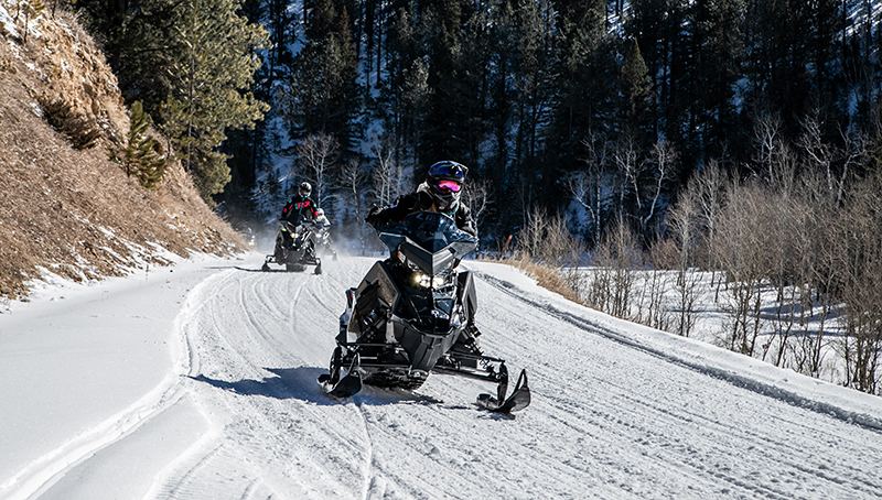 The similarities to off-road riding made the snowmobiles immediately comfortable for us, both experienced off-roaders, as we blazed down the beautiful snowy trail.
