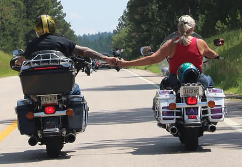 I love motorcycles and my husband. Here we pose during the Sturgis Motorcycle Rally, South Dakota, in 2019.