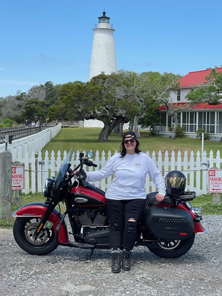Candi with her 2022 Heritage Classic at the Ocracoke Island Light Station in Ocracoke Village at the southern end of Cape Hatteras National Seashore, North Carolina.