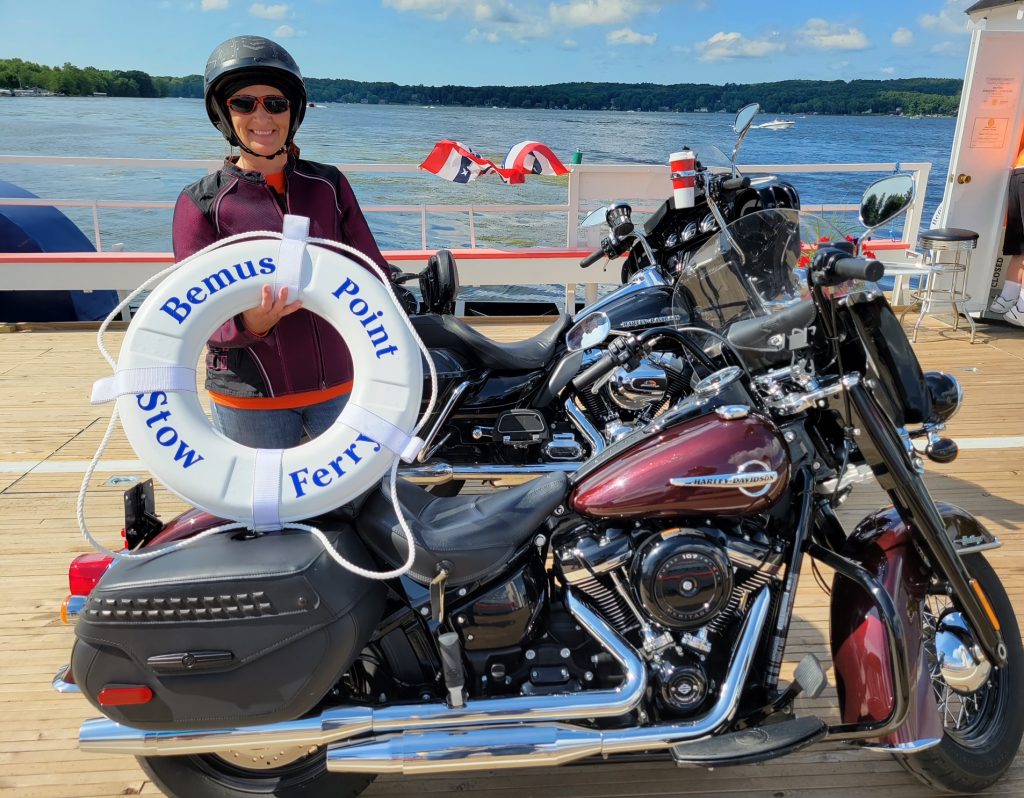 Kathy finds touring on the Heritage much more comfortable than with the Sportster. She rode from her hometown in Buffalo, New York, to the Catskill mountains near Albany, up to the 1000 Islands, and over to the Finger Lakes. Here she is on the Bemus Point ferry.