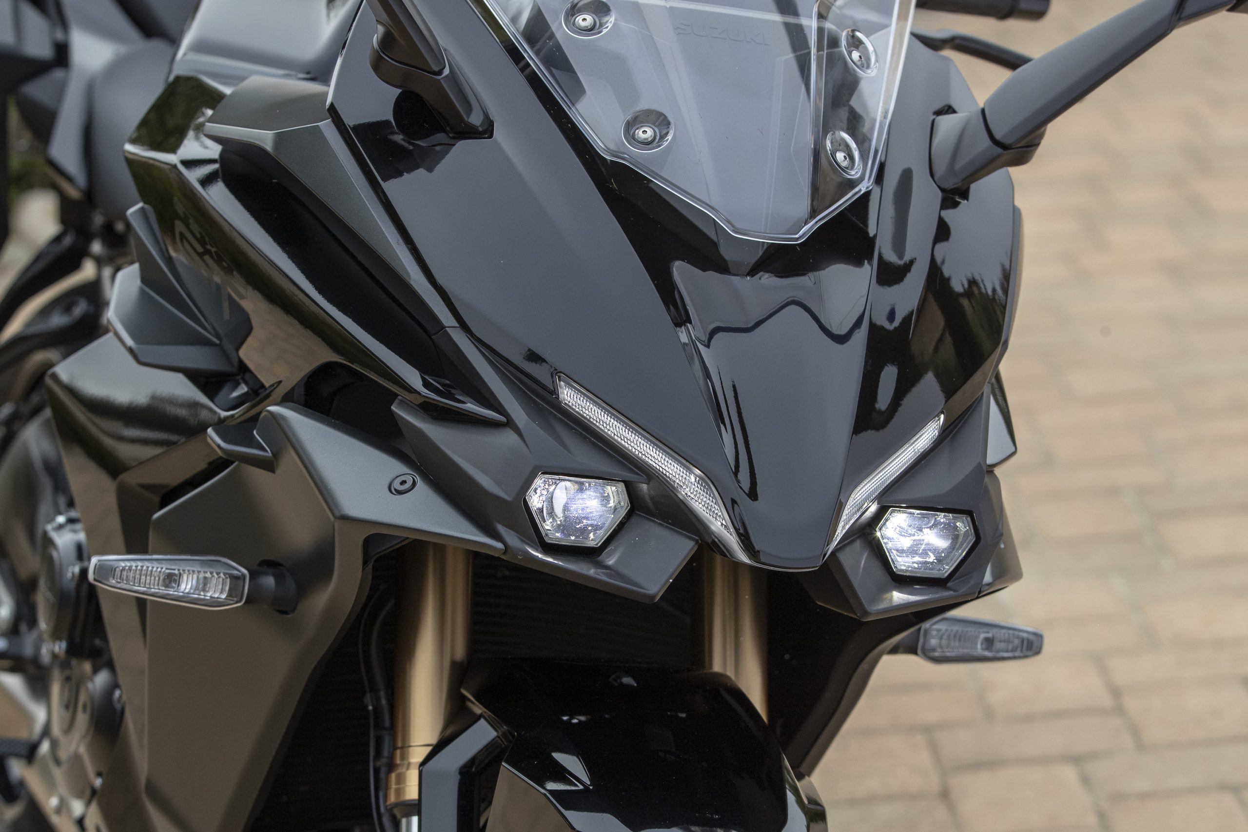 I love the aggressive, almost “mean” look of the front of the bike which employs small but strong mono-focus LED lights and very angular turn signals.