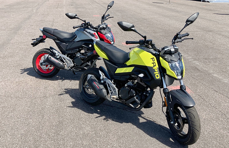 The <a href="https://womenridersnow.com/hondas-125cc-minimoto-lineup-offers-big-fun-in-small-packages/" target="_blank" rel="noopener"> mini-bike craze </a> is off the charts right now, and CFMOTO’s 126cc Papio delivers true competition to the current favorites. After watching some of the other journalists spin wheelies around the staging area all day it was clear the little monster is a grin-inspiring ball of fun.