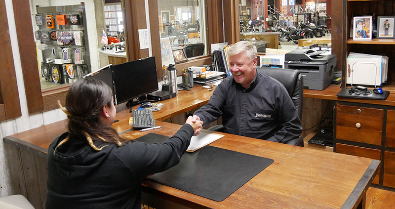 Calculate your professional worth before you sit down at the negotiation table to get to the happy result you deserve. Photo courtesy Mike's Famous Harley-Davidson's George and Shirl.