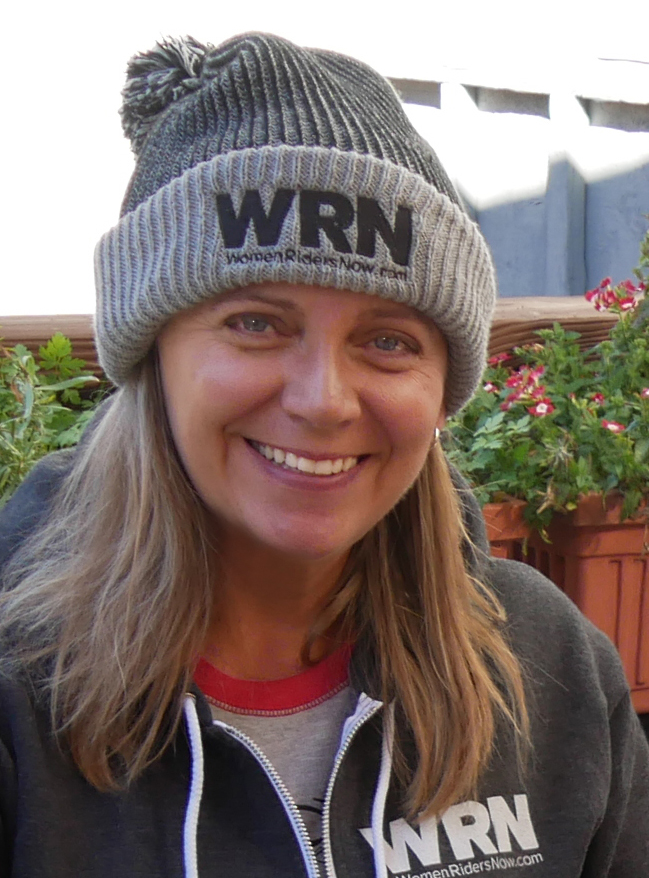 WRN Editor Tricia Szulewski sporting the WRN Pom Pom Beanie and Unisex Hoodie.