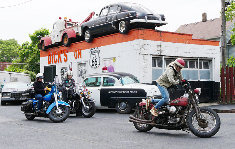 Chix on 66 jenny bass kickstarting vintage harley