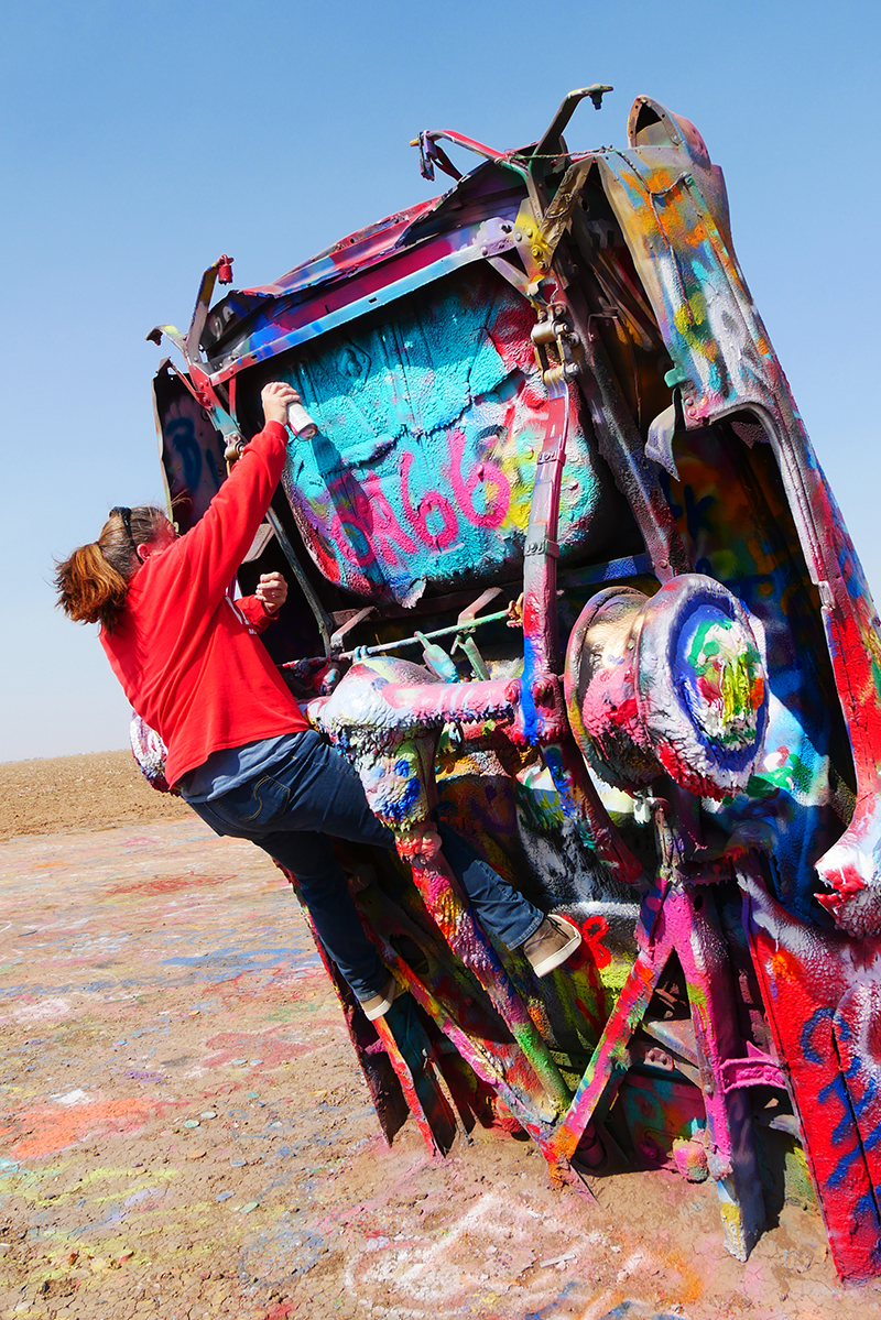 Kelly Biggs WomenRidersNow.com Cadillac ranch painting