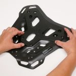 4: Place the Topcase mounting bracket over the SW-Motech luggage rack to see where the holes line up.