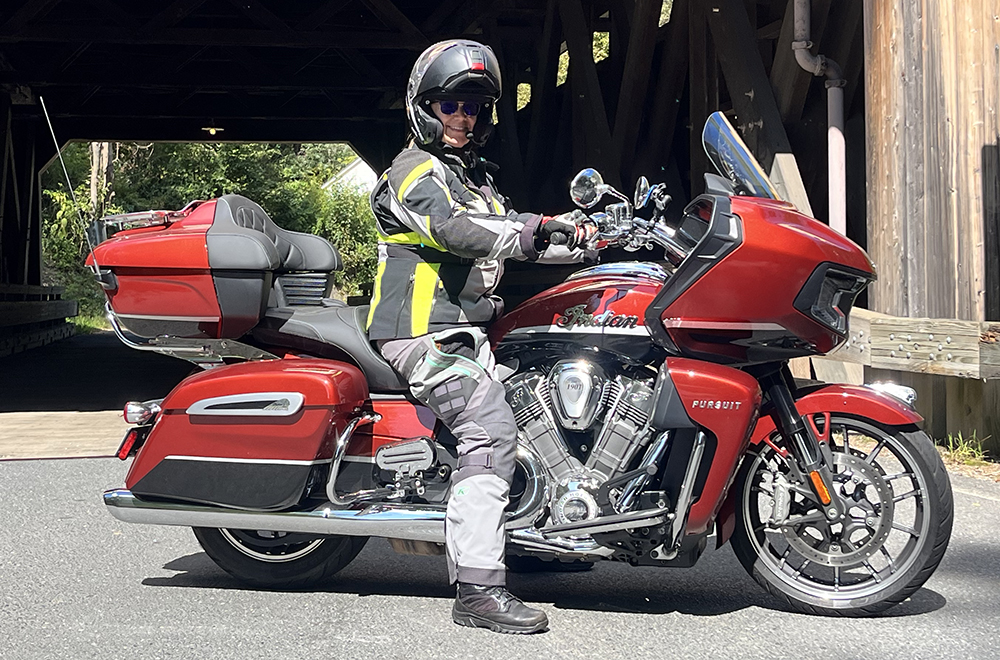 The 2022 Klim Artemis women’s pants come in three color options: Stealth Black, Peyote Potter’s Clay, and the Monument Gray/Wintermint (shown here.) It retails for $599.99 and comes in size 0 to 16 in regular length. Tall lengths are available in sizes 6 to 12. The overpants work well on ADV bikes as well as premium tourers, like this 2023 Indian Pursuit Icon.