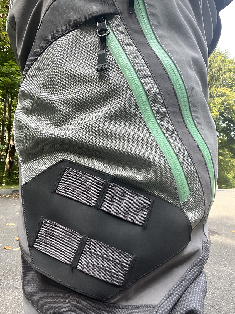 Mesh pockets and zippered vents in the front of the thighs keep you somewhat cooler on hot rides but are waterproof when zipped shut. MOLLE connection points offer a place to attach a small bag or accessory directly to your thigh.