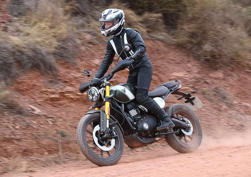 Woman rider Triumph Scrambler X 400
