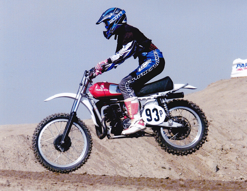 Mary McGee racing Husqvarna dirt bike