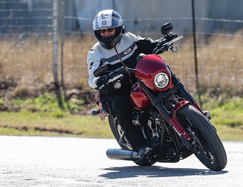 Woman riding Harley-Davidson Low Rider S Fennimore jacket