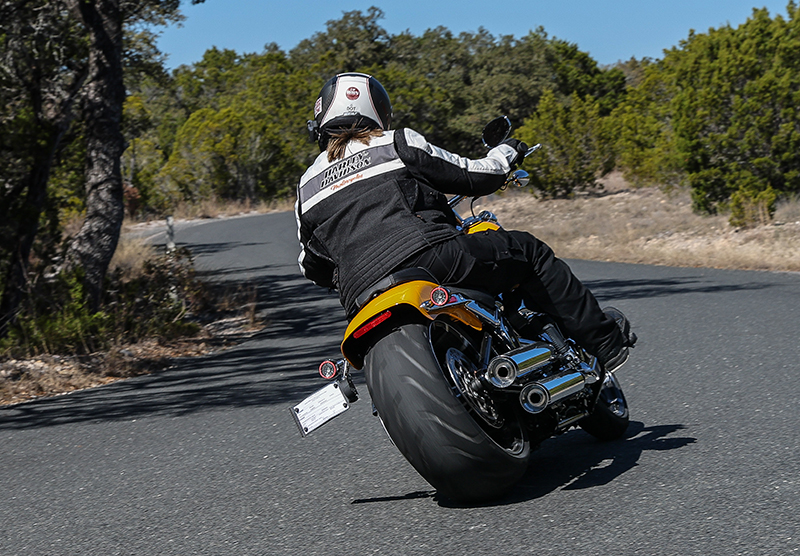 25_Riding_Breakout_rear woman riding 2025 Harley Breakout