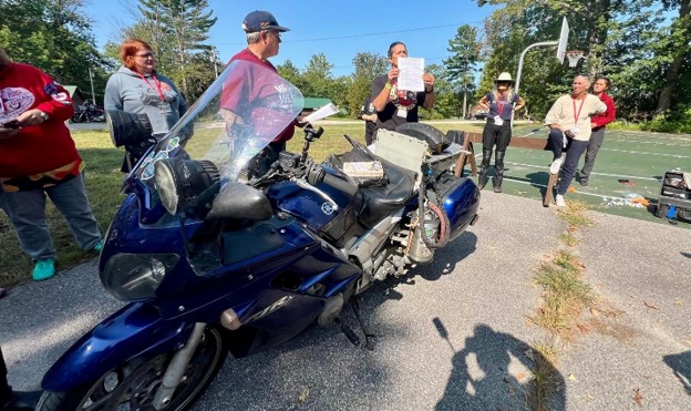 Picture8 Wendy Crockett and Liza Miller offer WIMA participants a class on tire repair and basic motorcycle maintenance.