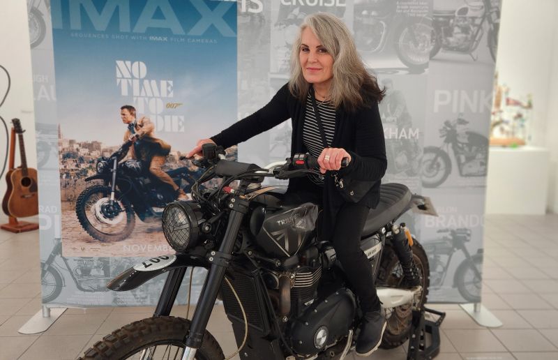 Triumph’s iconic motorcycles have long played a starring role on screen and in real life. From Angelina Jolie’s action-packed chase scene in Salt to Pink’s Bonneville T100, these Triumphs are more than props—they’re personality on two wheels. Shown here, I sit on the James Bond (played by Daniel Craig) bike at the Triumph museum exhibit in Oceanside, California.