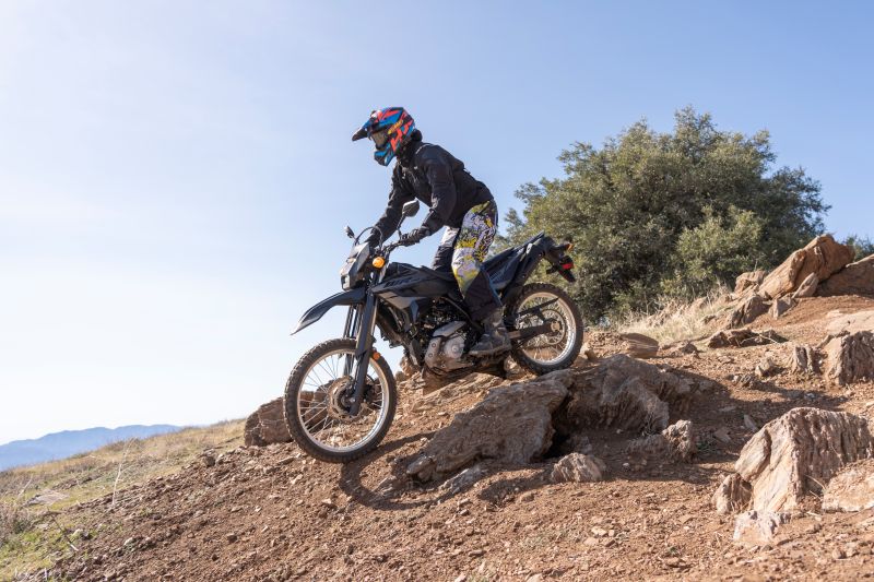 The WR125R’s KYB suspension handles rocks and ruts with ease.