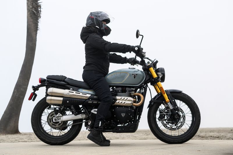 The 2026 Triumph Scrambler 900 features a 31.1-inch seat height, which is low for a scrambler style motorcycle in general. The Scrambler 900 is lower, even, than the Scrambler 400 at 32.8-inches. This makes the 900 significantly more accessible for shorter riders compared to both the taller 400 X and the generally much taller, dirt-focused 1200 models (32.2-34.3 inches depending on model and options).
